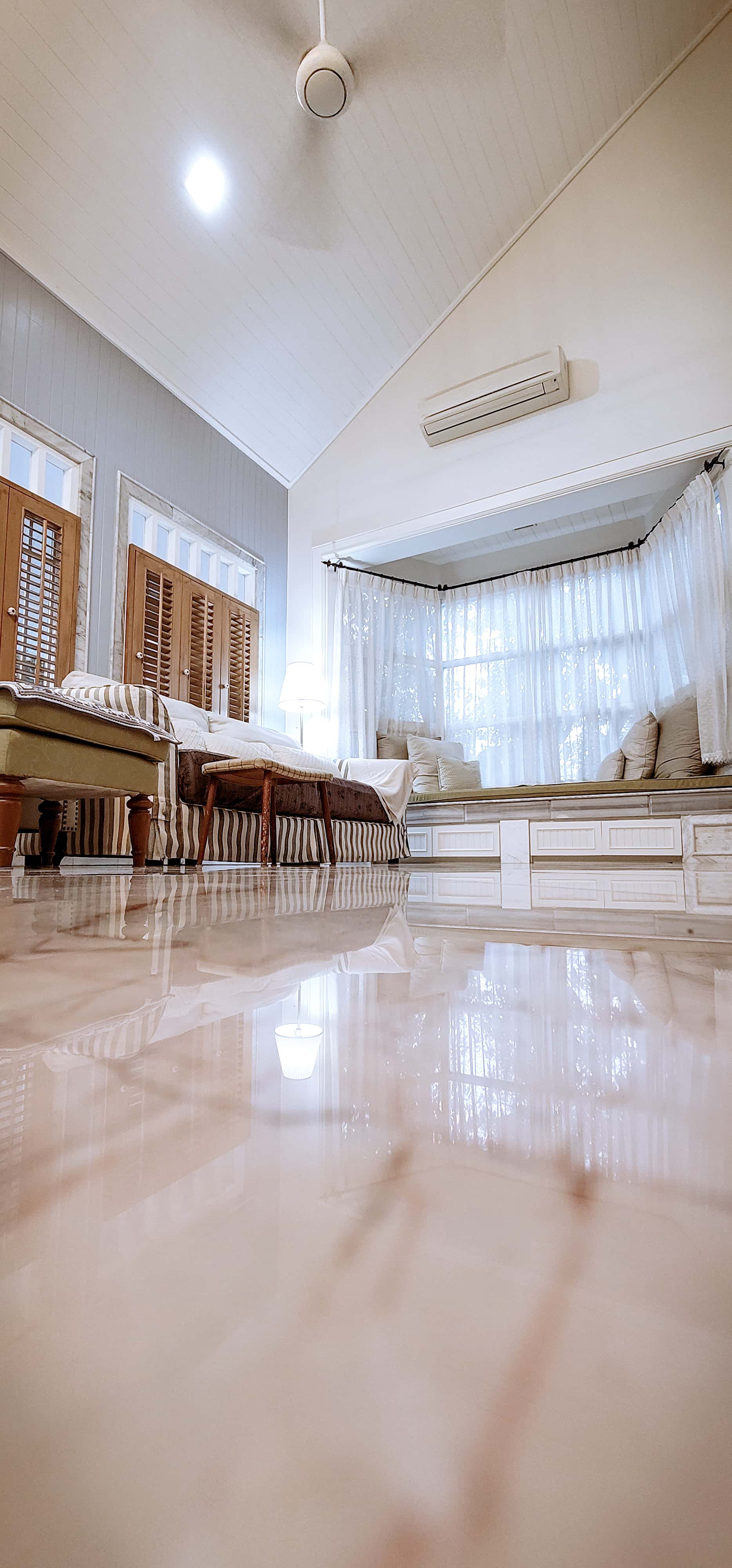 Modern marble kitchen with under-lighting and polished surfaces